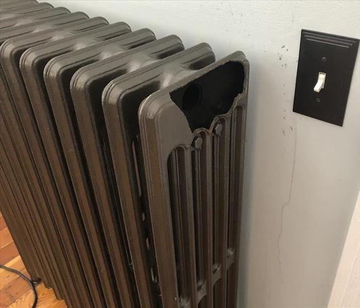 Frozen radiator broke open